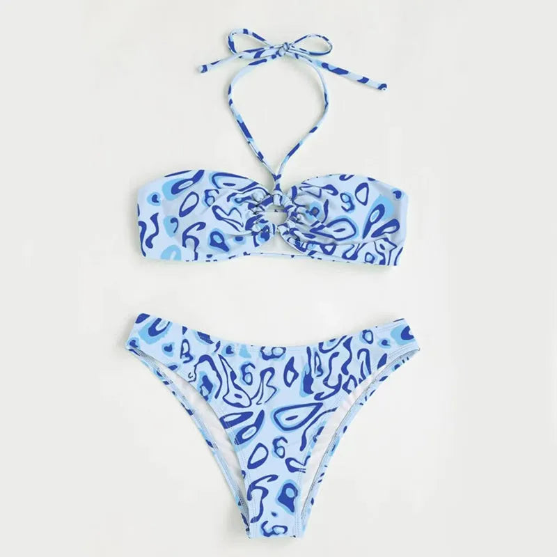 Women's blue floral bandeau bikini with split design and backless styling for swimming
