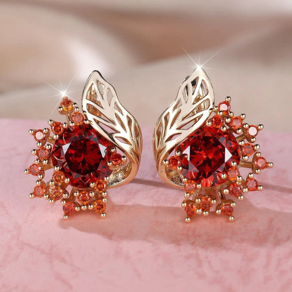Round flower feather design earrings for women in champagne gold with colourful zircon stone accents.