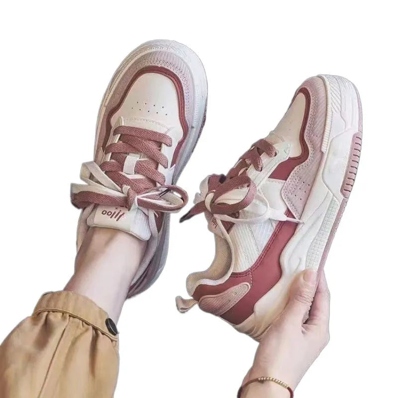 Women's pink and beige low-top height increasing sneakers with rubber soles