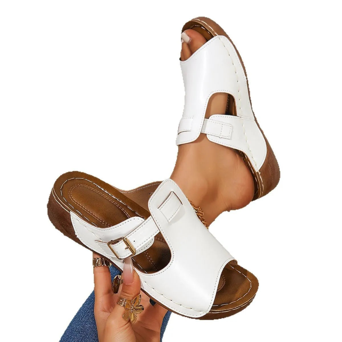 Women's white magic stick slippers with fish mouth toe design on a light background