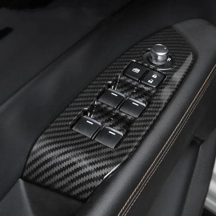 Pair of carbon fibre patterned steering wheel frame overlays for 21 left and right style installation.