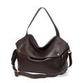 Brown genuine leather women's commuter shoulder bag with horizontal square shape showing internal zippered compartment