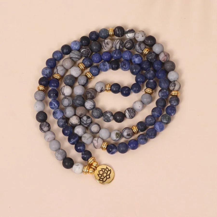 Blue multi-layer bracelet with patterned network stone beads and alloy metal components