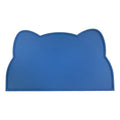Blue silicone pet feeding mat with cat head shape under food and water bowls