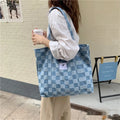 Women's large shoulder bag in oxford cloth with 3D pockets, shown in blue.