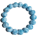 Blue bodhi bracelet with sea-pattern crystal stone and pearl accents in Maillard style.