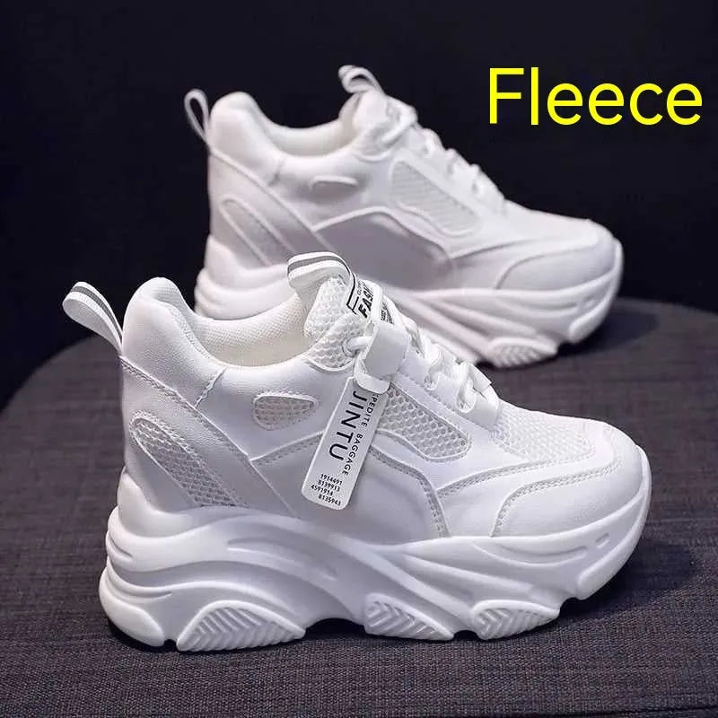 Women's black mesh platform casual shoes with hollow-out design and a toe holder on a white background.