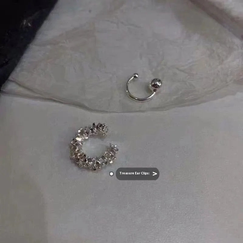 Women's clip-on earrings with irregular geometric shape and frosty finish in alloy
