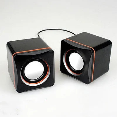 Small black square USB-powered 2.0 computer speaker for desktop placement