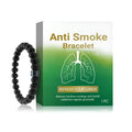 Men's smoke prevention bracelet made of glass and black gallstone on a wrist.