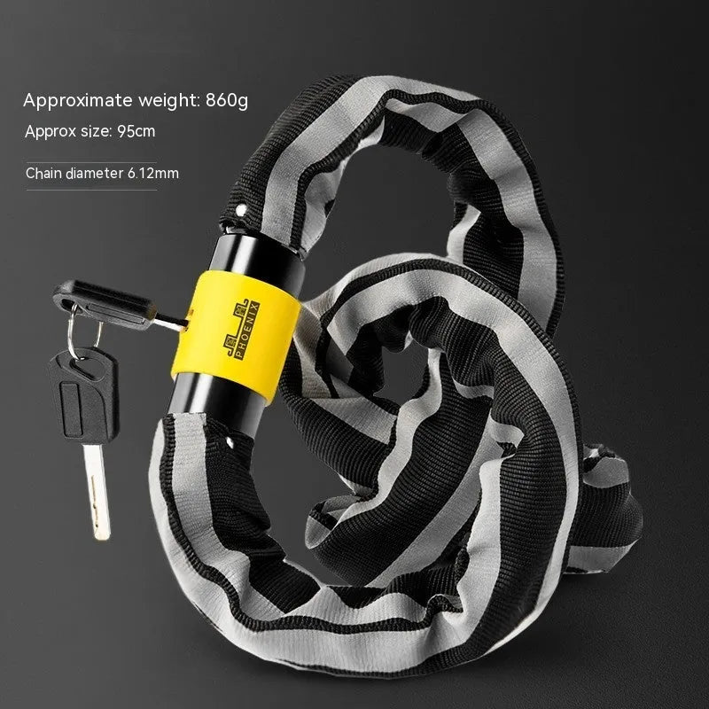 Black zinc alloy mountain bike chain lock with a 95 cm chain coiled on a grey background.