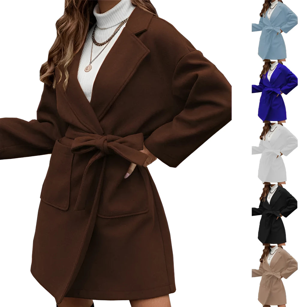 Brown loose-fit long coat with lapel, buttons, belt, and split hem on a model.