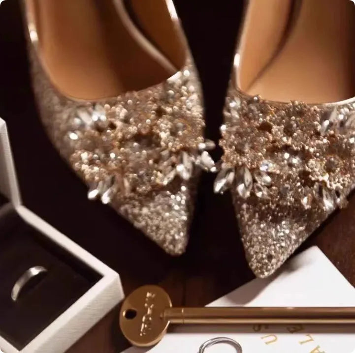 Champagne coloured wedding shoes with crystal design, pointed toes and fine heels