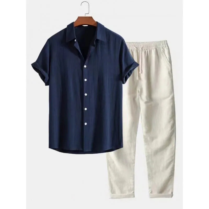 Man wearing a loose-fit short-sleeve shirt and trousers from a casual linen-blend suit set.
