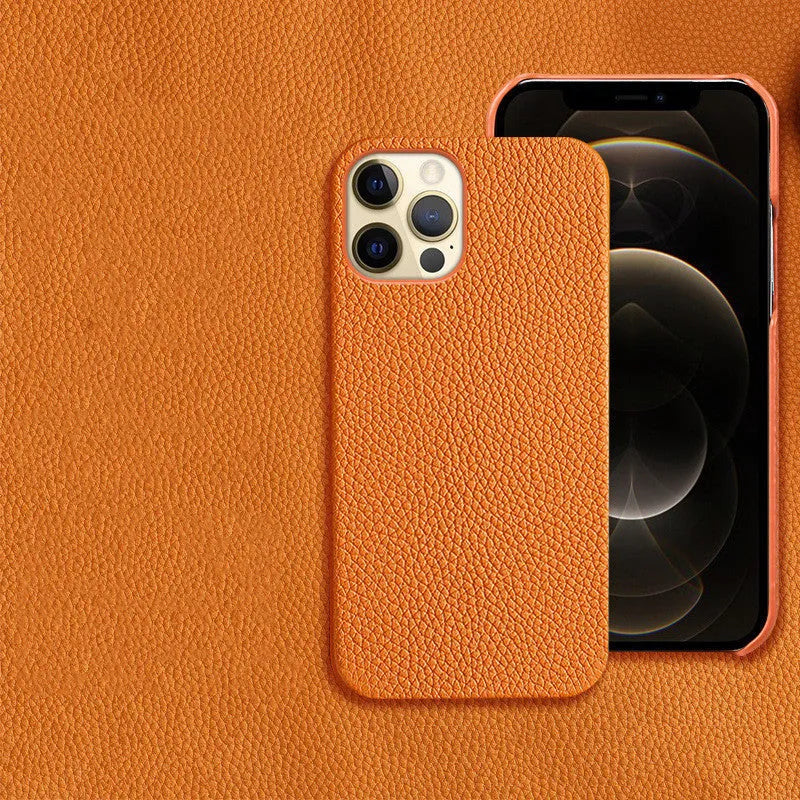 Genuine brown leather shatterproof protective case for iPhone on a table.