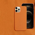 Genuine brown leather shatterproof protective case for iPhone on a table.