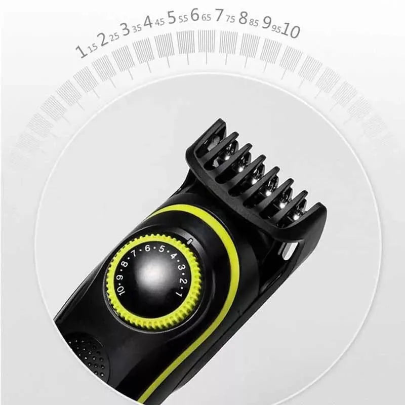 Black KM-696 rechargeable electric hair clipper set with stainless steel blades on a white background.