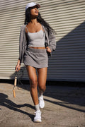 Women's casual hooded jacket and skirt outfit in street hipster style