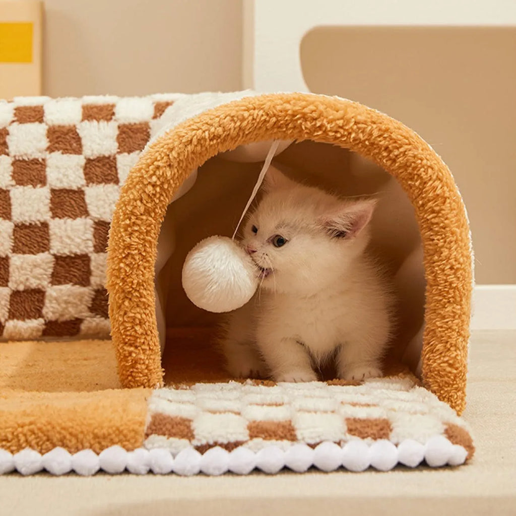 A coffee-coloured plush fan-shaped pet bed with an attached tunnel for cats and dogs.