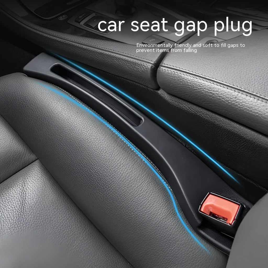 Black plastic car seat gap storage box with handle between vehicle seats