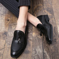 Men's black pointed toe slip-on business shoes with tassel detail