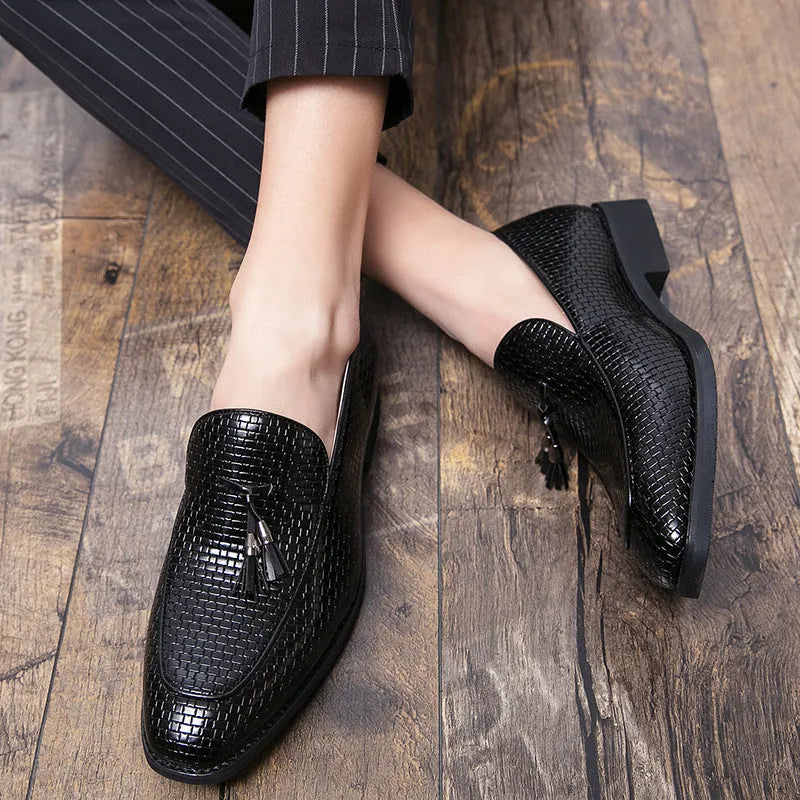 Men's black pointed toe slip-on business shoes with tassel detail