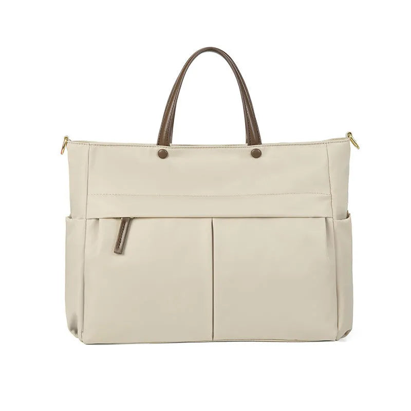 Women's Oxford cloth laptop briefcase in elegant black colour with open pockets and contrast stitching