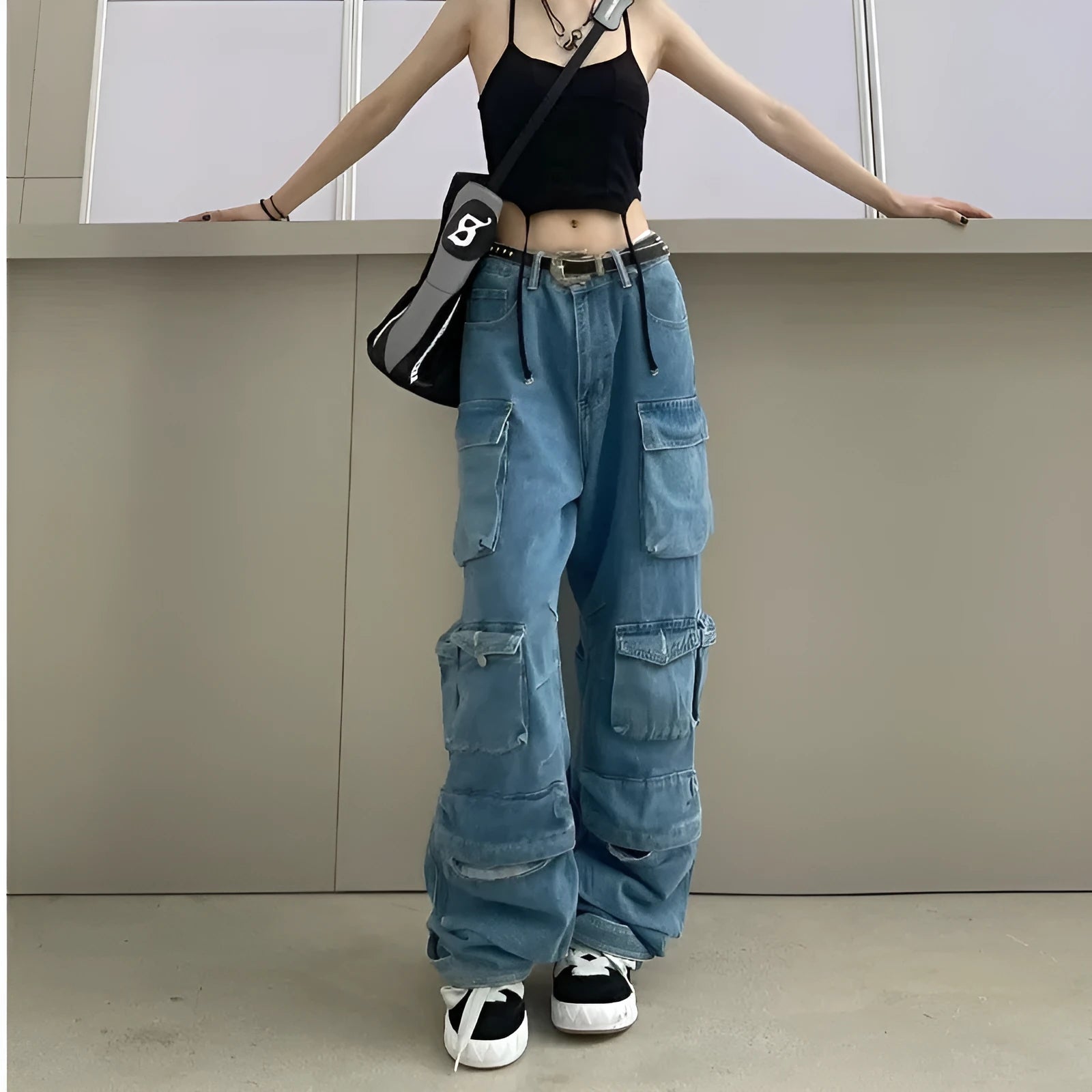 Blue tie-dyed high waist wide leg jeans with multiple pockets and street hipster styling