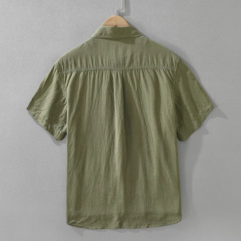 Loose-fit short-sleeve cardigan top in lyocell fabric, shown in black colour.