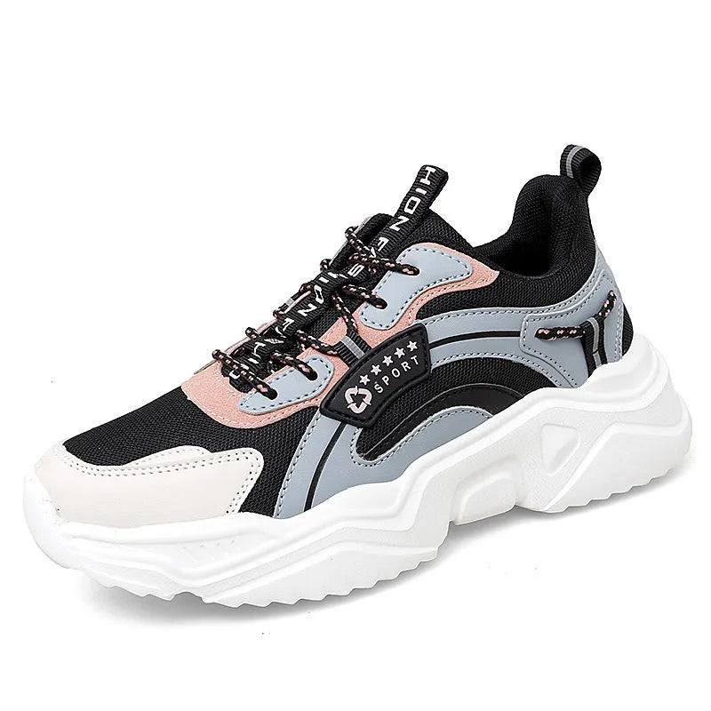 White women's casual sports shoes with mesh upper, thick PU sole, round toe, and buckle detail.