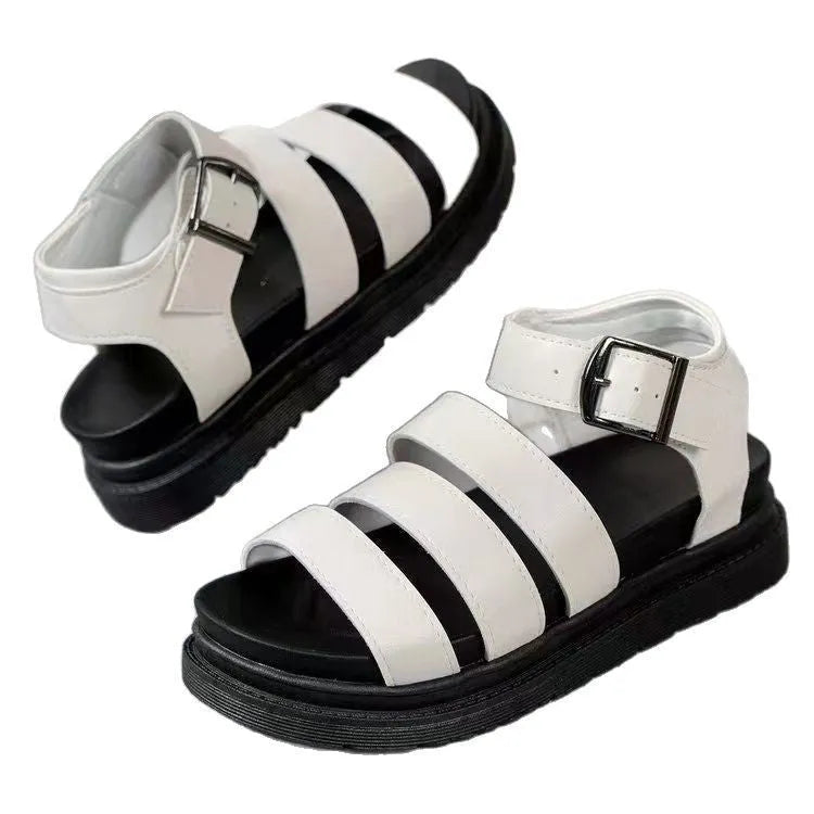 Thick sole buckle strap sandals in black, white, or orange colours showing PU upper and rubber sole