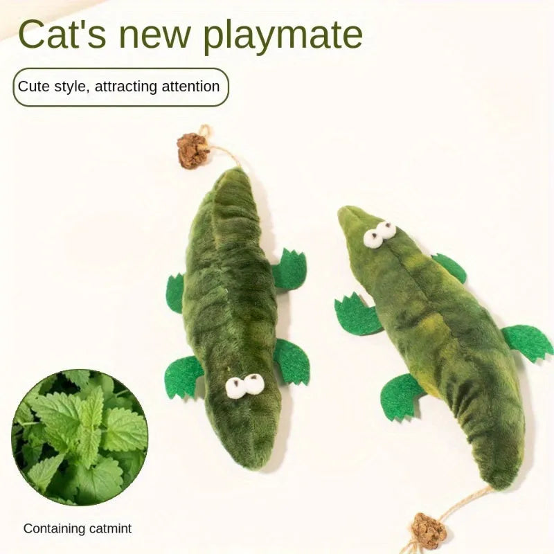 Green plush alligator catnip toy with peppermint scent for oral cleansing and stress relief