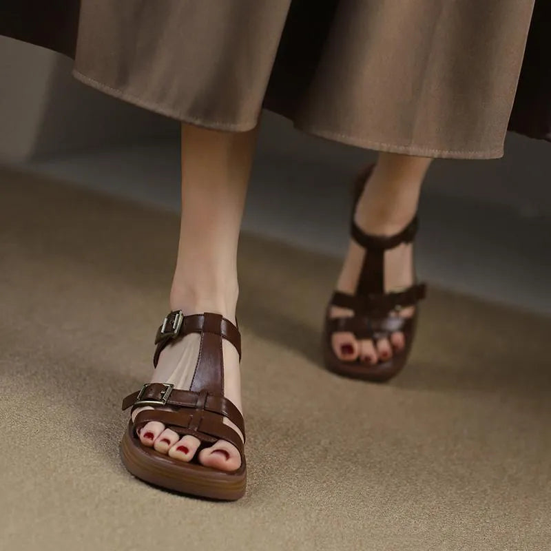 Women's black retro sandals with T-buckle strap, open toe, platform, and chunky heel