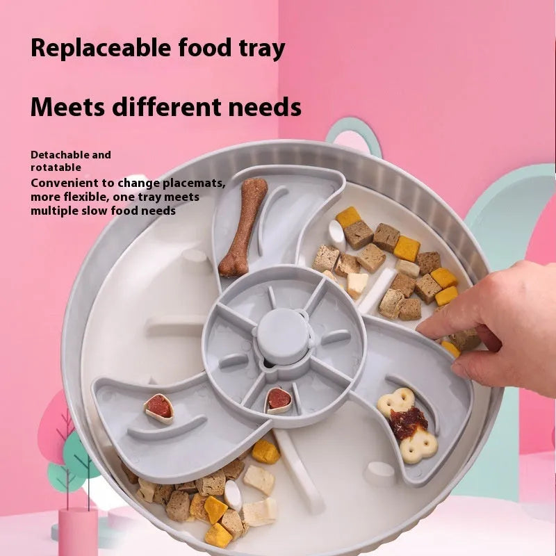Rotating pet slow feeder bowl with game board surface and removable silicone licking mat in blue.