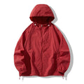 Thin loose fit outdoor sports jacket in various colours on a hanger, showing front and back detail.