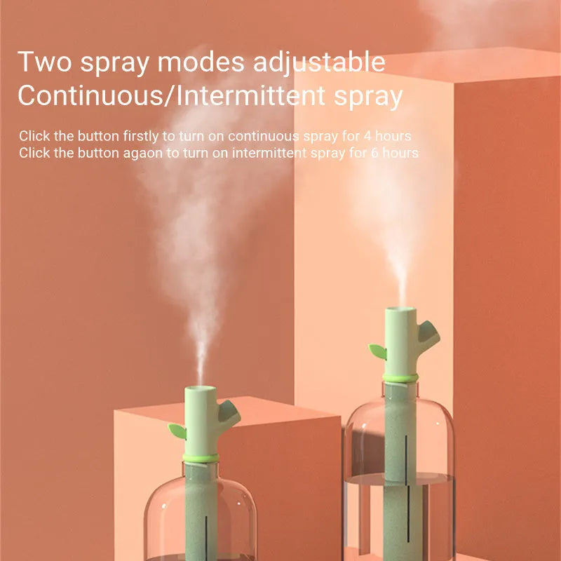 Transparent plastic portable USB humidifier on a desk with mist output
