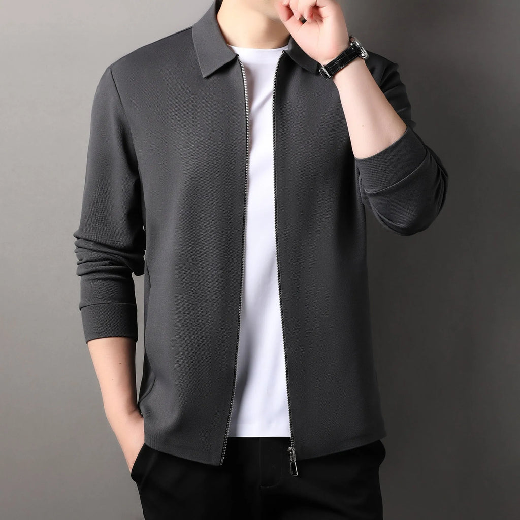 Men's polyester casual business jacket in black, straight hem, long sleeves, shown on a model.