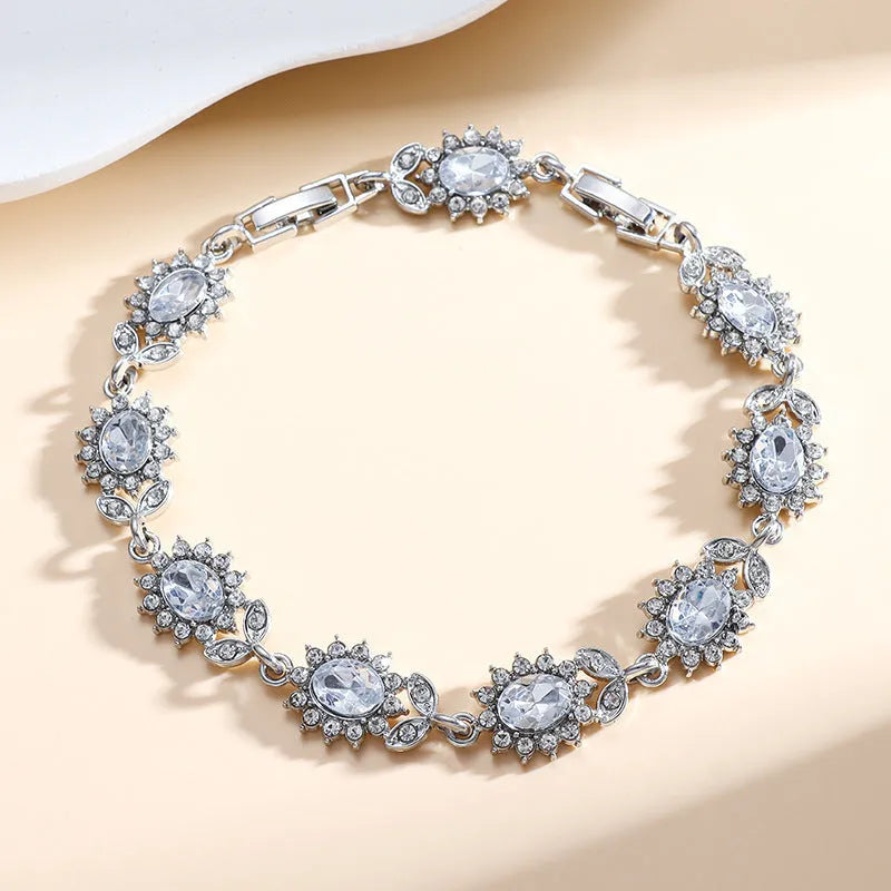 Women's simple zircon bracelet with coloured gemstone settings on electroplated environmentally friendly alloy
