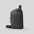 Men's elegant black Oxford cloth crossbody bag showing lightweight design and sewing thread reinforcement