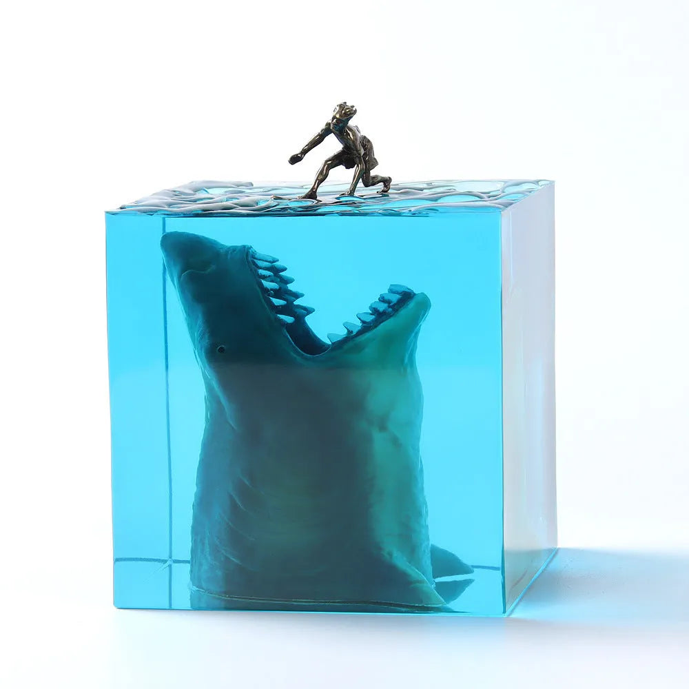 Clear epoxy resin night light ornament with a shark surfer scene inside, shown in 5cm and 8cm sizes.