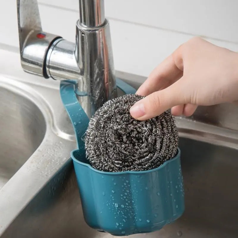 Nordic-style plastic sink drain basket in dark blue, measuring 20cm by 10cm.