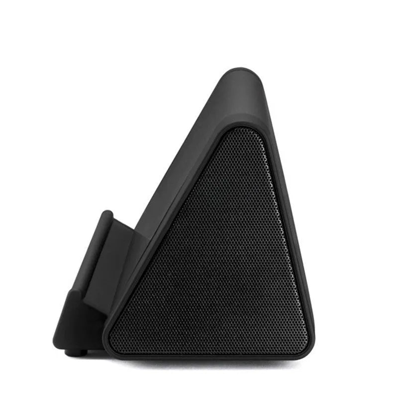 Small black or white wireless Bluetooth mini speaker for mobile phones and laptops.