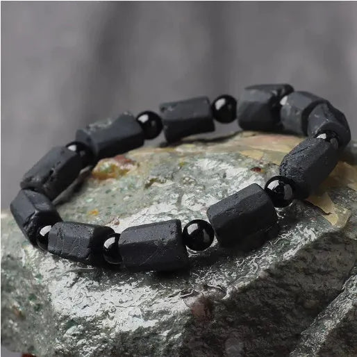 Natural black tourmaline rough stone bracelet with approximately 9mm beads and seiko polished finish