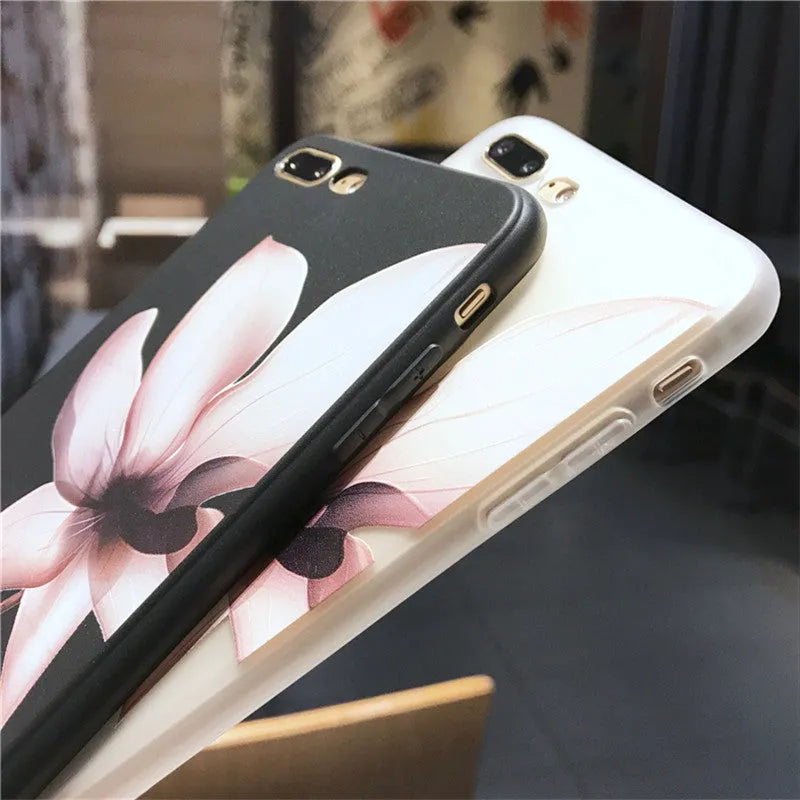 Embossed floral TPU phone case for iPhone in black and white colour options showing raised pattern detail
