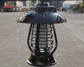 White and black solar mosquito lamp with solar panel, 24 LEDs, and two-way switch for outdoor insect control.
