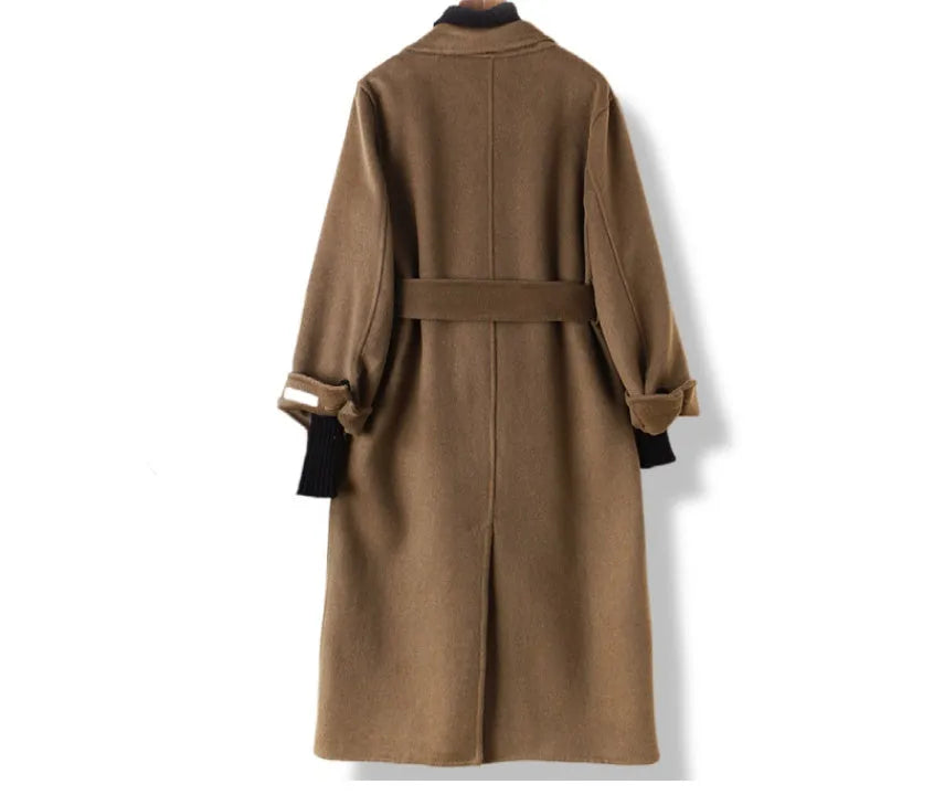 A long caramel-coloured wool coat for men with a formal suit-style collar laid flat.