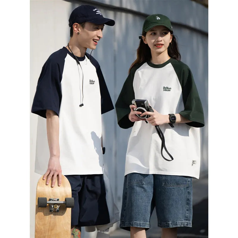 Blue Japanese-style loose men's t-shirt with raglan sleeves on a hanger