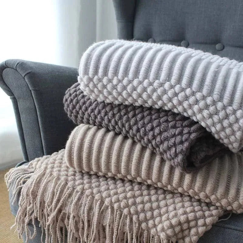 Small polyester nap blanket in dark grey, khaki, or light grey colours showing 127x170cm dimensions