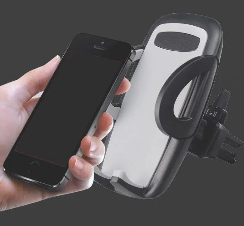 Black car air vent mobile phone holder mounted on vehicle air conditioning outlet
