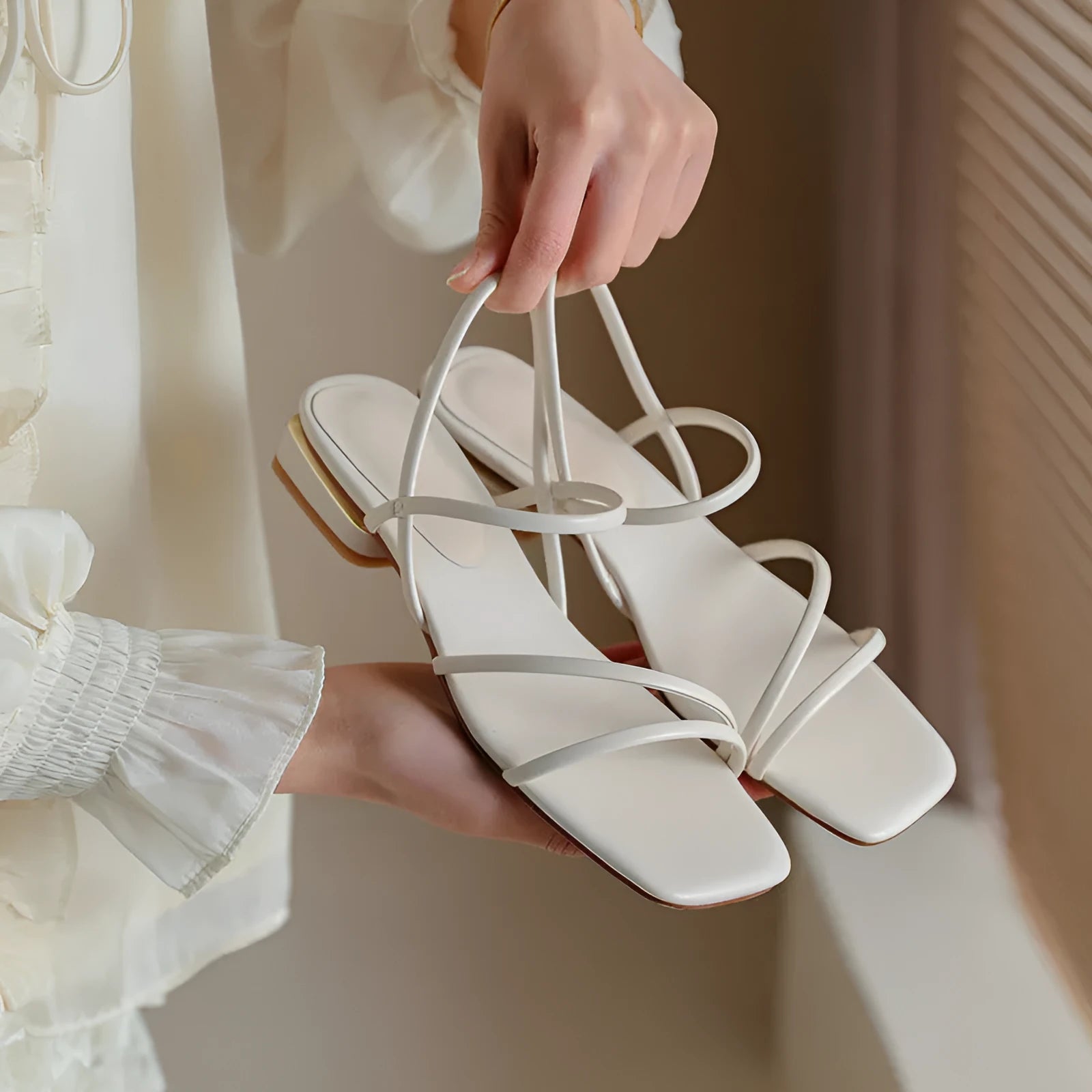 Women's flat strap Roman sandals with square toe in microfiber, shown in beige colour.